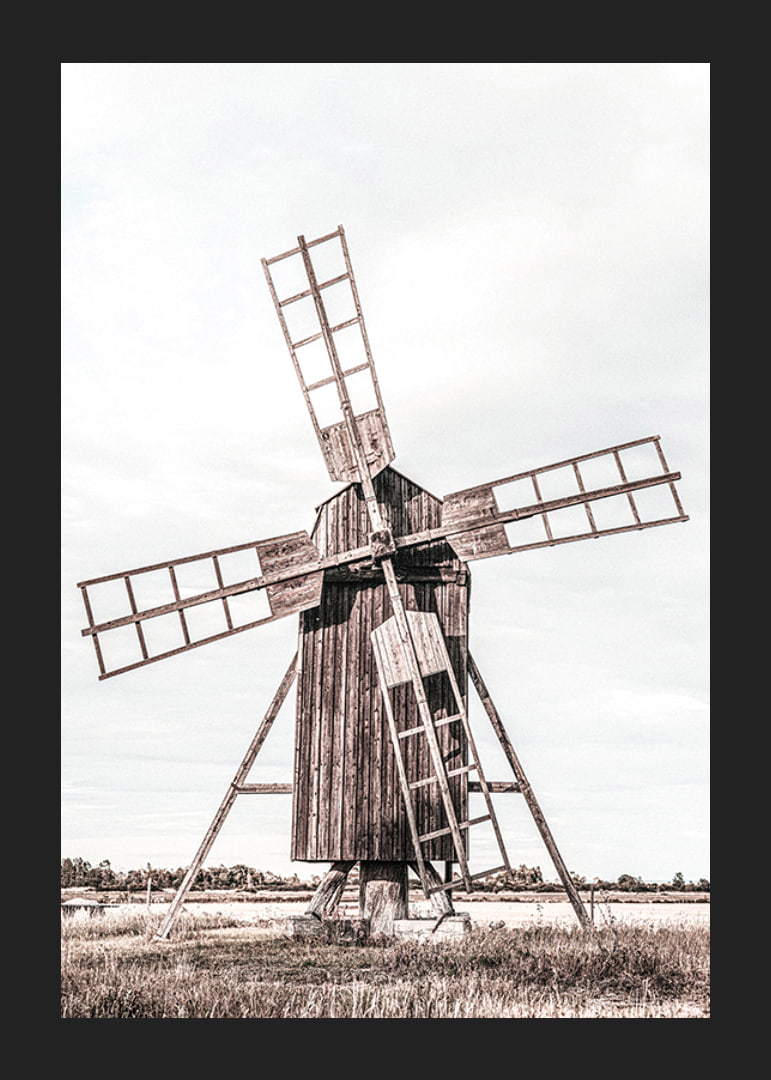 Photograph of old wooden windmill in open field-12