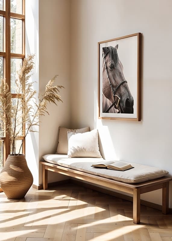 Close-up of brown horse with halter against light background-12