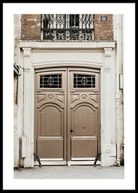 Photograph of classic brown gate in Paris with decorative details-0