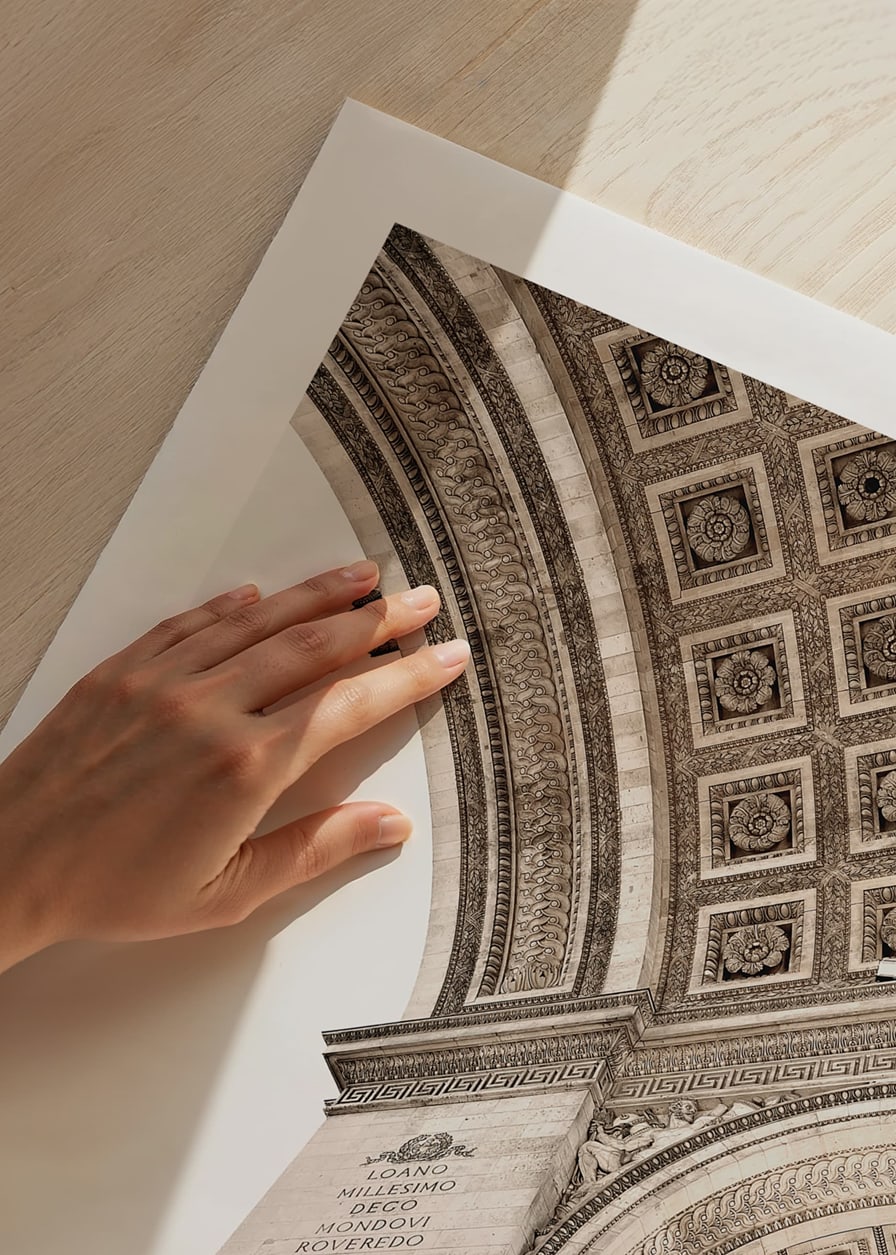 Photograph of the inner vault of the Arc de Triomphe in beige tones-12