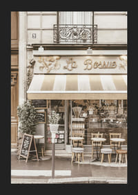 Photograph of Parisian cafe with outdoor seating in beige tones-5