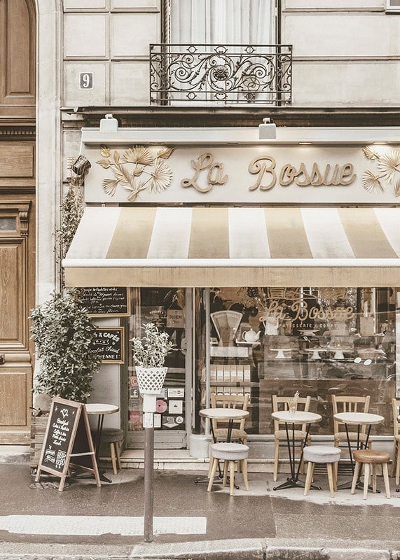 Photograph of Parisian cafe with outdoor seating in beige tones-12