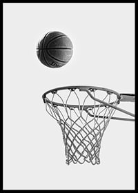 Black and white photo of basketball above basket against light background-6