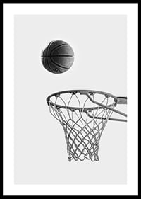 Black and white photo of basketball above basket against light background-0