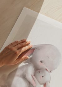 Illustrated rabbit family in soft pastel colors, white background-9
