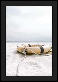 Photograph of lifebuoy on light sandy beach with ocean in the background-4