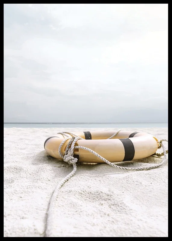 Photograph of lifebuoy on light sandy beach with ocean in the background-12