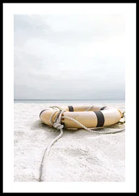 Photograph of lifebuoy on light sandy beach with ocean in the background-0
