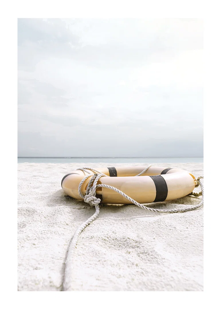 Photograph of lifebuoy on light sandy beach with ocean in the background-12