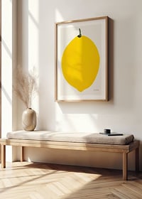 Graphic illustration of a yellow lemon against a light background-8