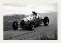 Black and white photography of classic racing car in motion-3