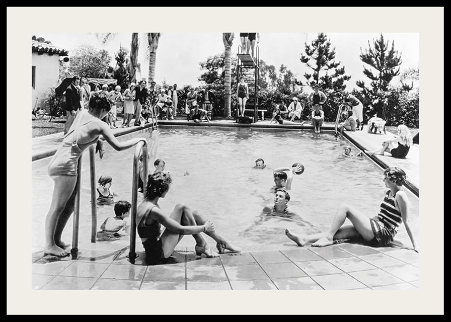 Black and white photo of pool party with bathers and spectators, 1930s-12