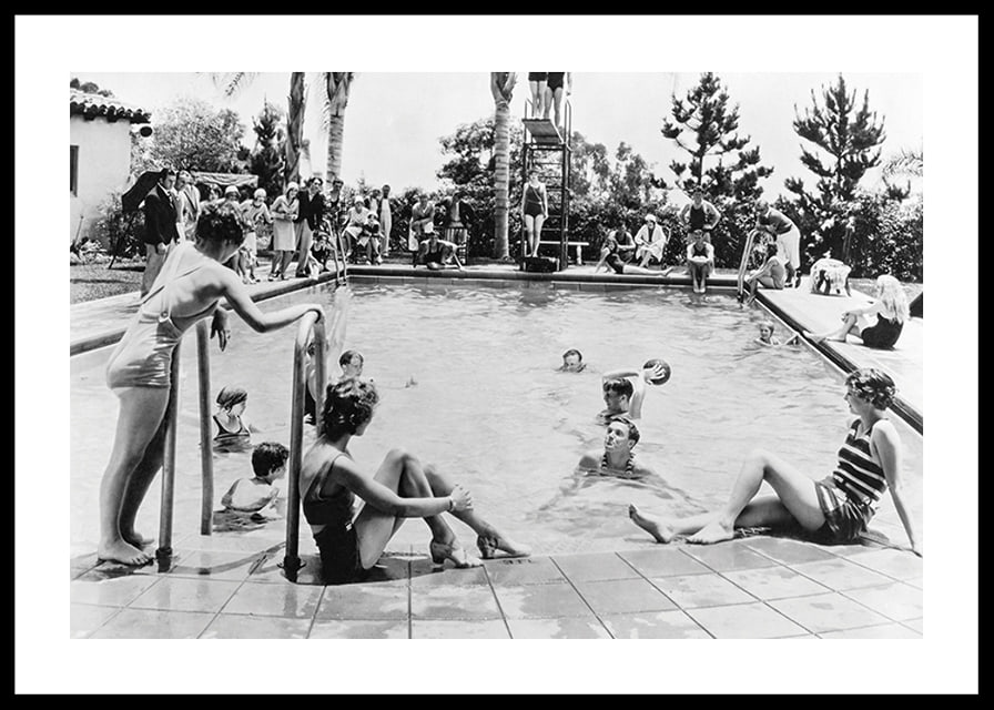 Black and white photo of pool party with bathers and spectators, 1930s-12