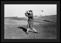 Black and white photograph of male golfer in classic attire-4