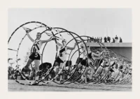 Black and white photo of female gymnasts with large hoops-3