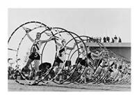 Black and white photo of female gymnasts with large hoops-1