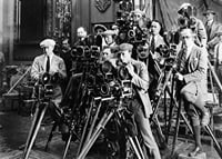 Black and white photo of group of photographers with classic cameras-7