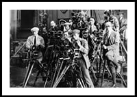 Black and white photo of group of photographers with classic cameras-0