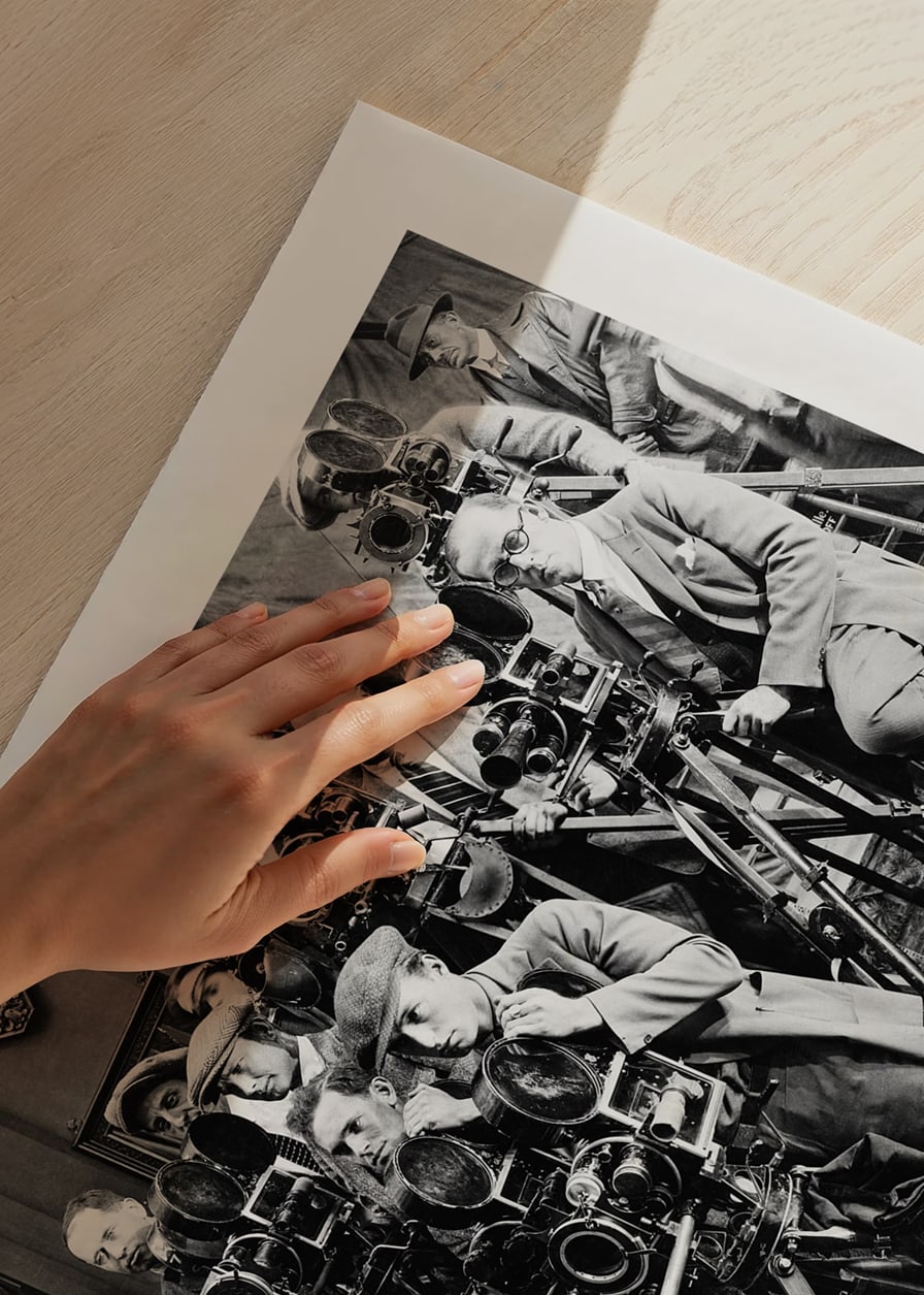 Black and white photo of group of photographers with classic cameras-12