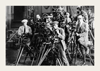 Black and white photo of group of photographers with classic cameras-3