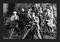 Black and white photo of group of photographers with classic cameras-5