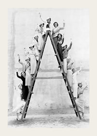 Black and white photograph of women in 1930s clothing on ladder-3
