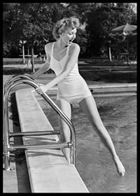 Black and white vintage photograph of woman at poolside in swimsuit-6