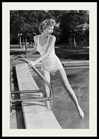 Black and white vintage photograph of woman at poolside in swimsuit-2