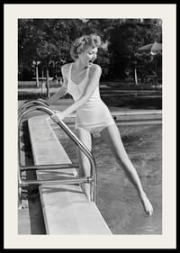 Black and white vintage photograph of woman at poolside in swimsuit-2