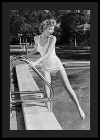 Black and white vintage photograph of woman at poolside in swimsuit-4