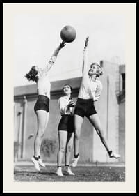 Black and white photograph of three women playing basketball outdoors-2