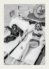 Black and white vintage photograph of woman and chimpanzee by pool-3