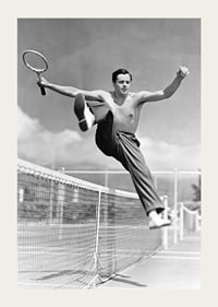 Black and white photo of bare-chested man jumping over tin netting-3