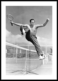 Black and white photo of bare-chested man jumping over tin netting-0