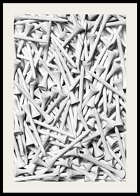 Close-up of white golf pegs in tight composition, black and white-2