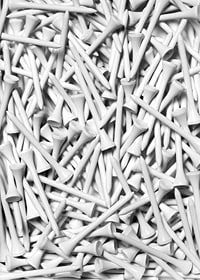 Close-up of white golf pegs in tight composition, black and white-7