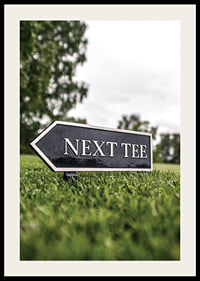 Photographic sign on golf course with the text Next Tee-2