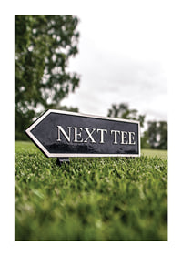 Photographic sign on golf course with the text Next Tee-1