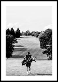 Golfer with bag against fairway in black and white landscape-0