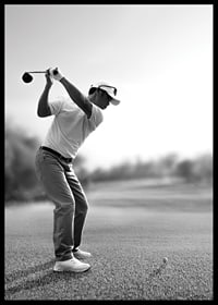 Black and white golfer in line with driver on fairway-6