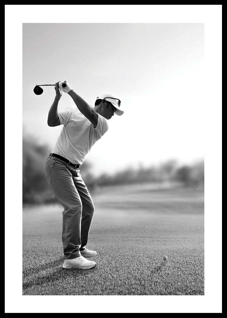 Black and white golfer in line with driver on fairway-12