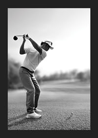 Black and white golfer in line with driver on fairway-5