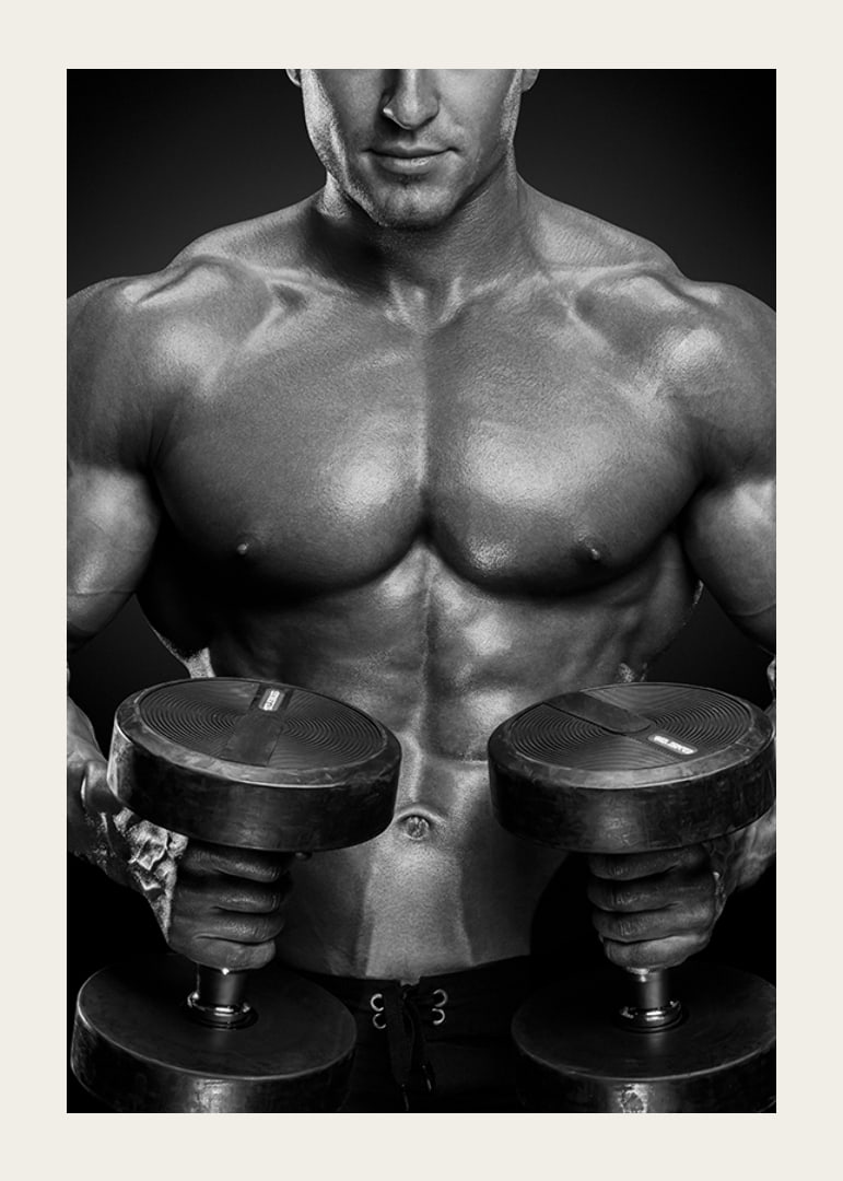 Black and white close-up of fit man with two dumbbells-12