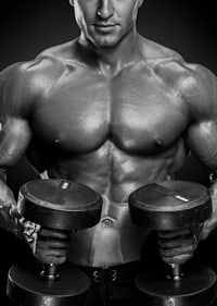 Black and white close-up of fit man with two dumbbells-7