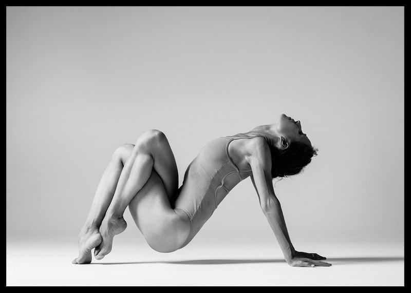 Black and white photo art of woman in yoga position against light background-12
