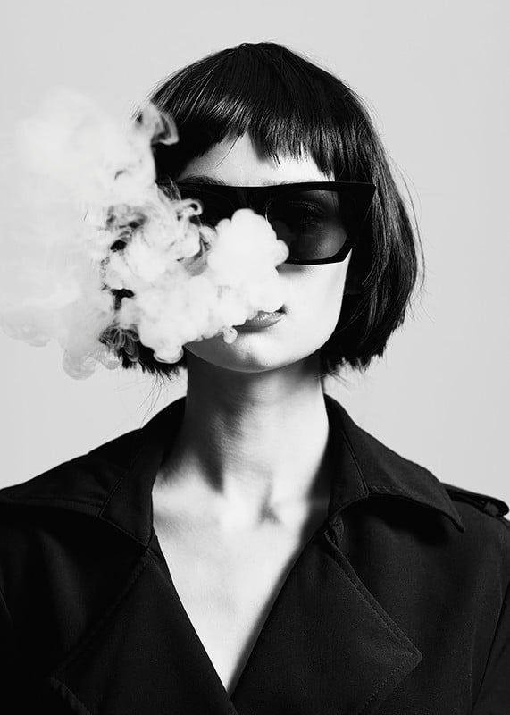 Black and white portrait of woman with sunglasses and smoke-12