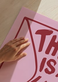 Graphic text illustration with the words 'This is a love letter' in red tone on pink background-3