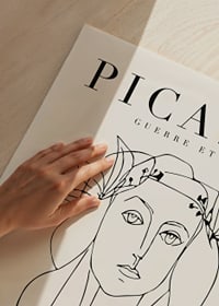 Minimalist line drawing of woman's face with laurel wreath in black-3