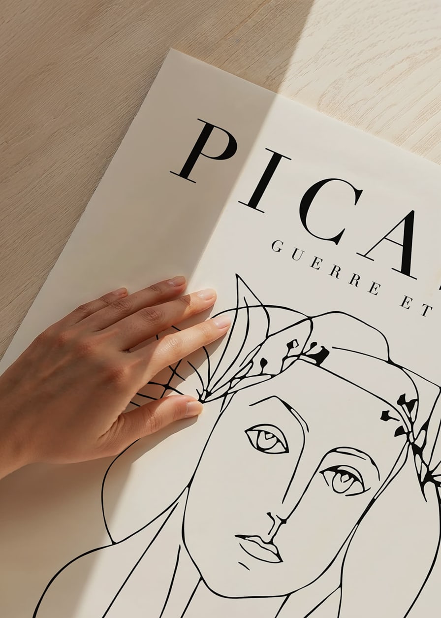 Minimalist line drawing of woman's face with laurel wreath in black-12