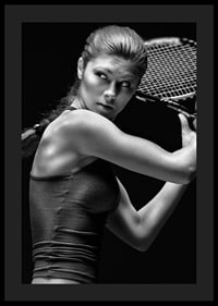 Black and white portrait of female tennis player in action-0